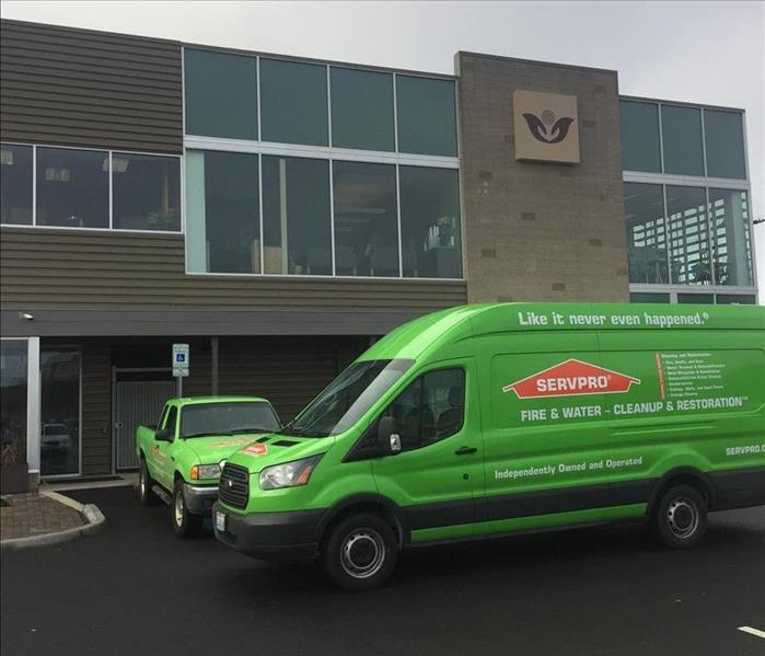 SERVPRO company vehicals at a local business